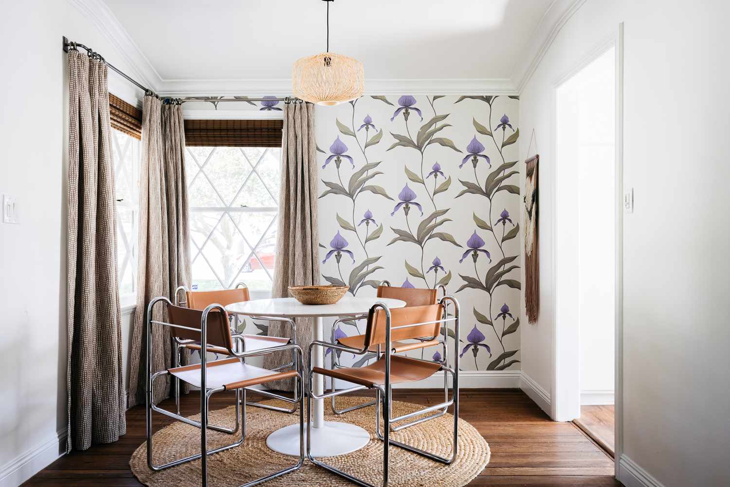 Bright room with a botanical patterned wallpaper wall