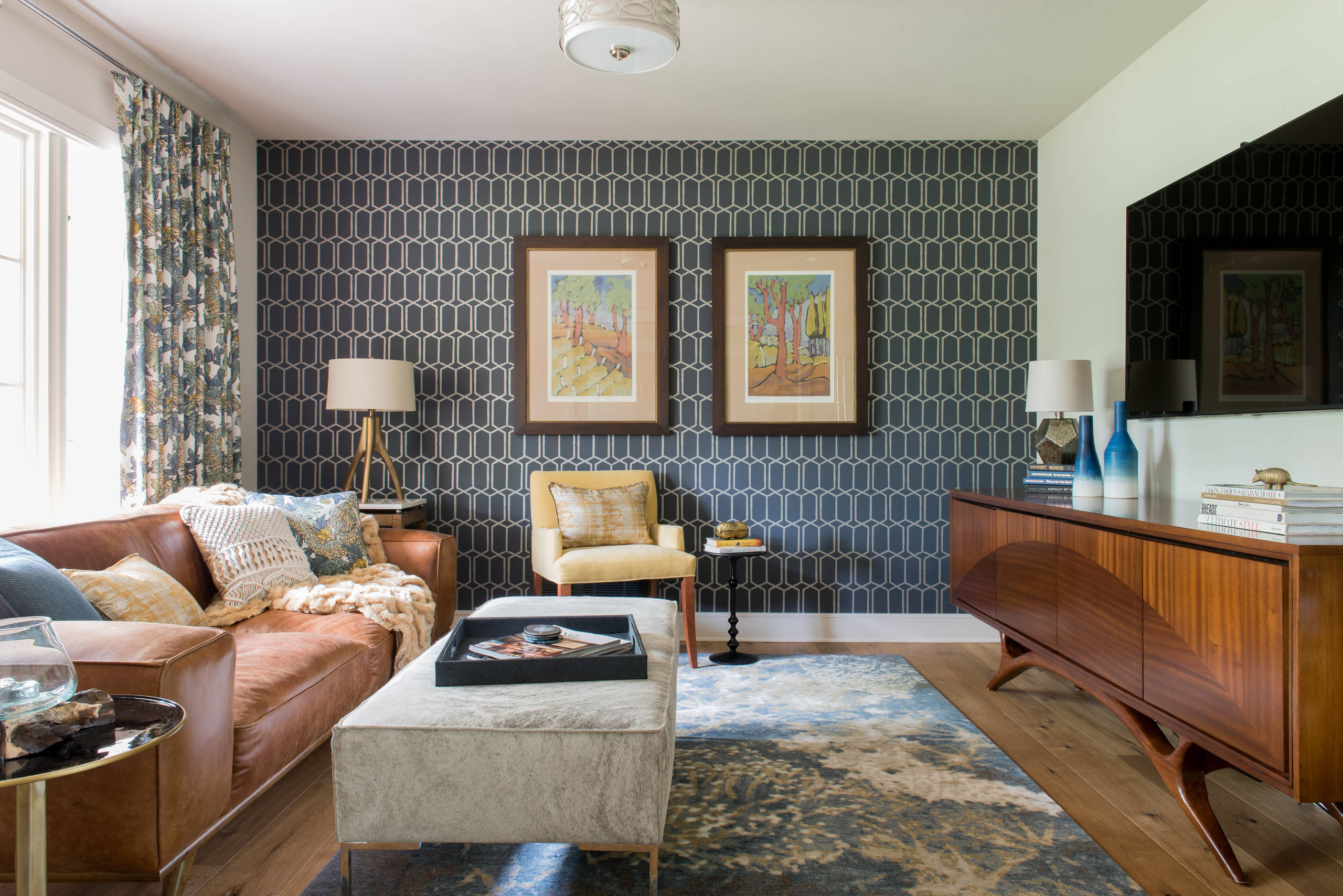 Residential interior with a patterned wallpaper wall